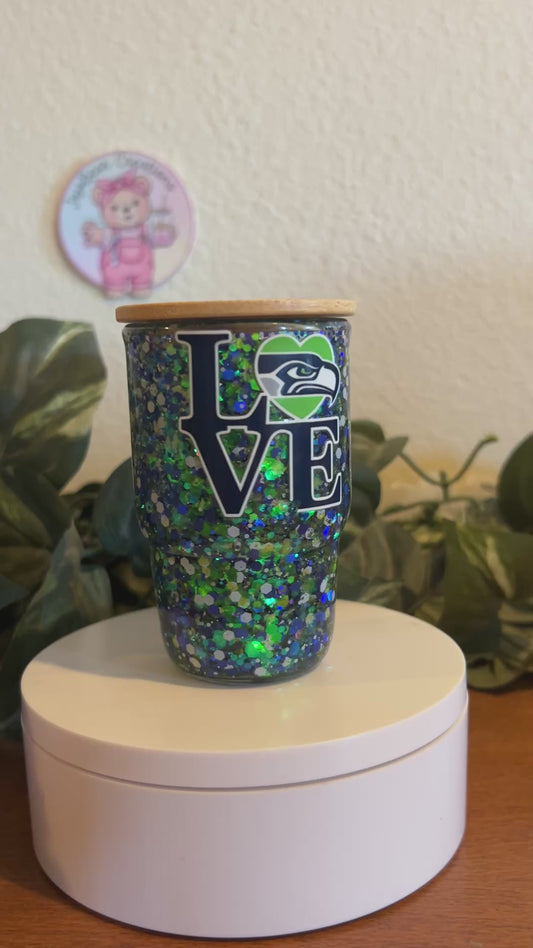 Seahawks 3oz glass shot glass. Does have a small part of the E missing. (5.00 off is reflected in listed price)